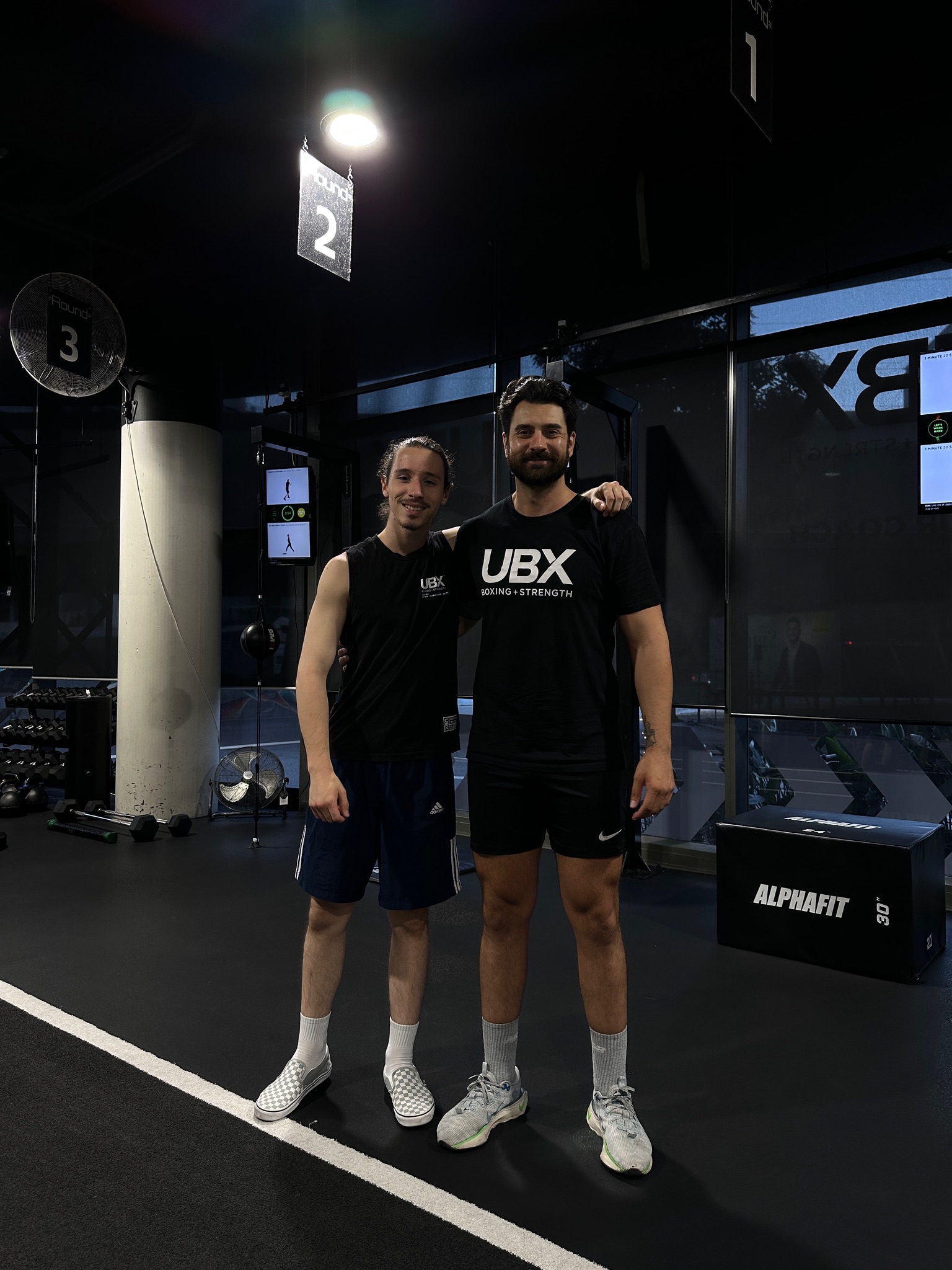 UBX South Bank coaches on the gym floor